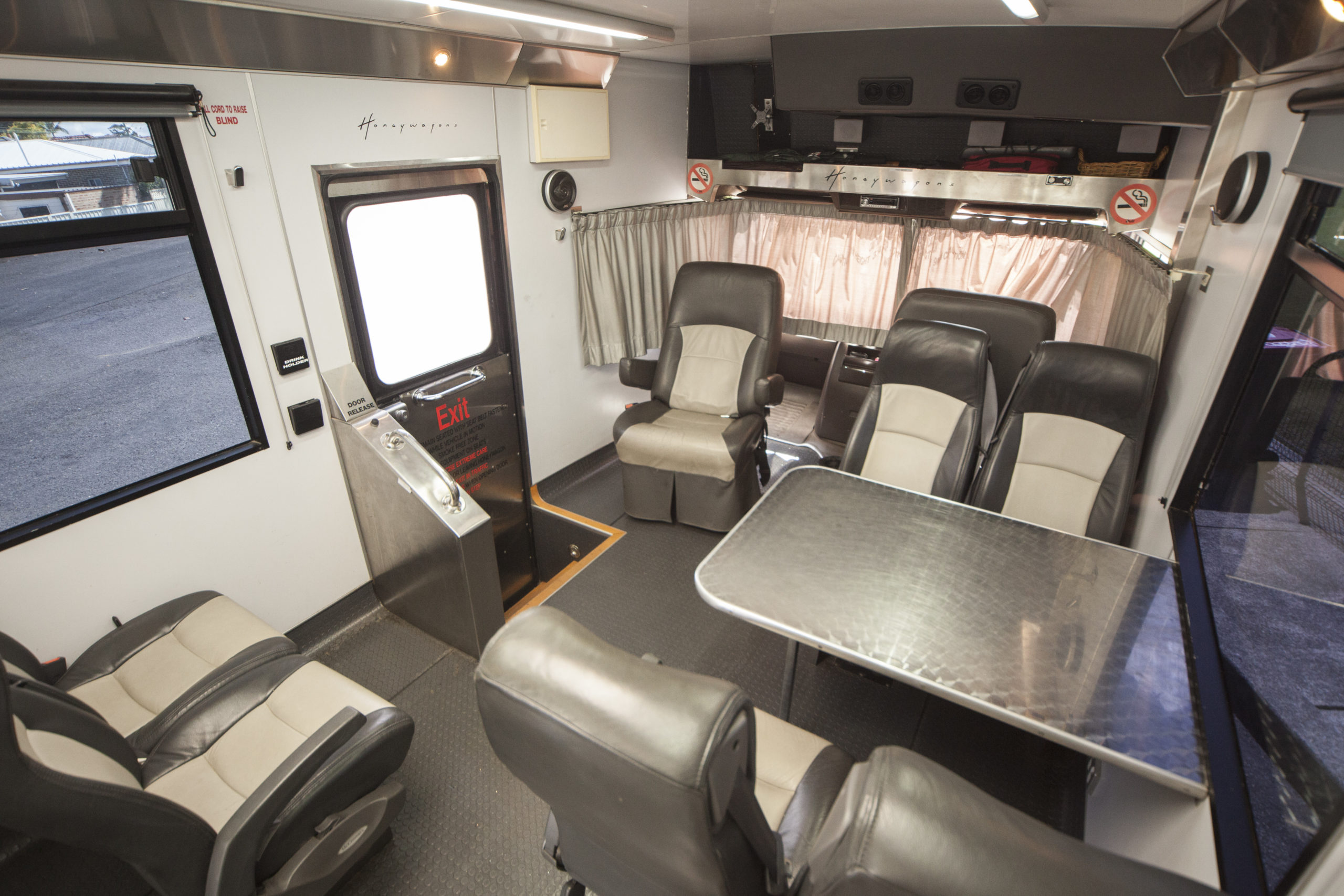 Production officeThe front and rear view conference area includes TV monitor, DVD player, CD player and radio, blackout blinds and vanity curtains, reverse-cycle air conditioning. We are also licensed to transport seven passengers.